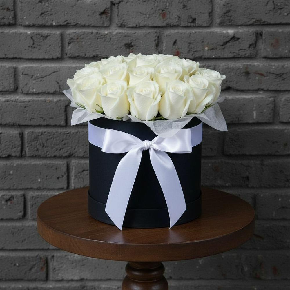 Цветочная композиция из Розы в шляпной коробке в Подосиновец